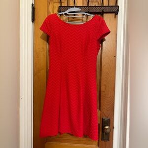 Red dress. Size 6. Good quality. Silver zipper on back.